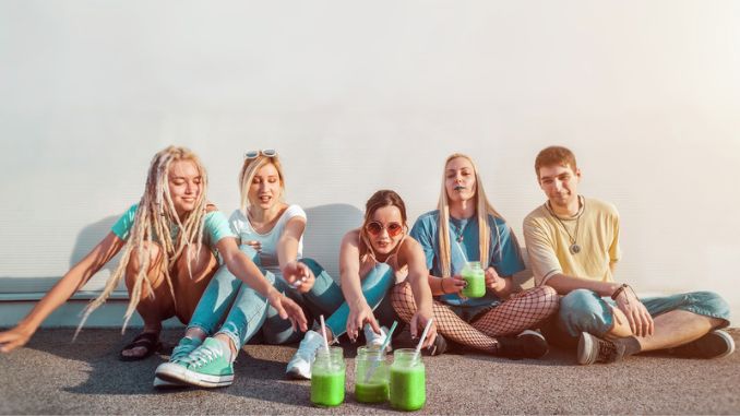 people-reaching-green-fruit-smoothies