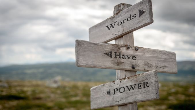 Old wooden sign post