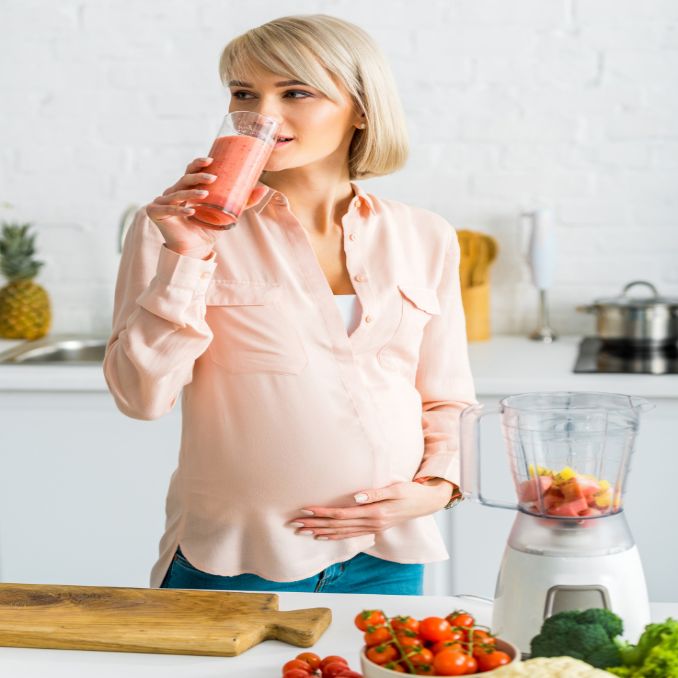 pregnant woman drinking smoothie - Lactation Smoothie