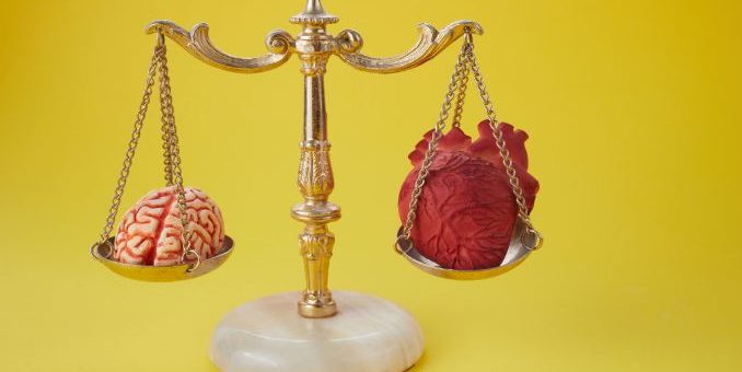 brain-and-heart-on-a-balancing-scale