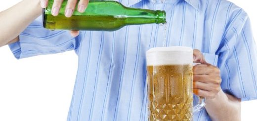 man-pouring-beer-glass